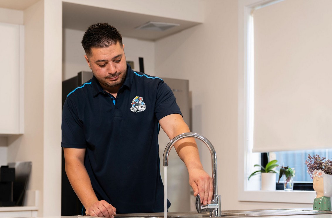 plumber checking tap
